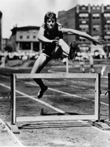 Babe Didrikson, demonstrates her hurdling technique. 1932.